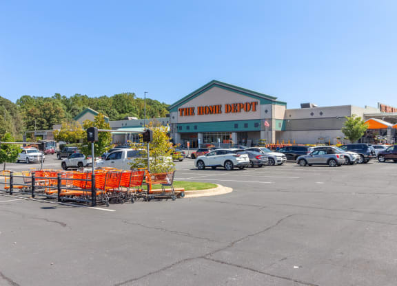 a shopping center with a parking lot in front of it at Fairmont at South Lake, Bowie, MD, 20716