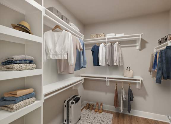 A white closet with clothes and a hat on the shelf. at The Sully, Chantilly, VA, 20151