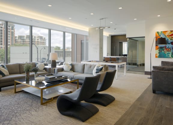 a living room with a couch and chairs and a table at 1305 Dock Street, Baltimore, MD, 21231