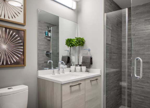 a bathroom with a sink and a shower at 1305 Dock Street, Baltimore, MD
