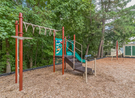 our playground is equipped with a swing set and a slide at Sanger Place, Virginia, 22079