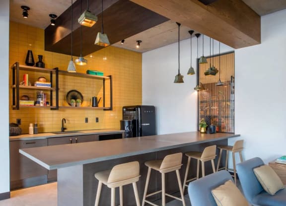 the kitchen and dining area of a modern house at Reed Row, Washington