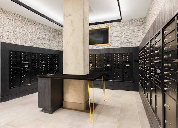 a wine cellar with racks and a table in the middle  at Coda at Bryant Street, Washington, DC