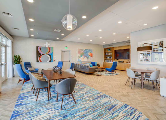 a room with a table and chairs and a couch at Celebration, Celebration, FL 34747