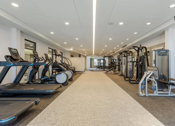 a gym with treadmills and other exercise equipment at Delamarre at Celebration, Celebration Florida