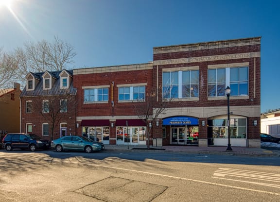 a brick building with cars parked in front of it at North Market South Carroll, Maryland