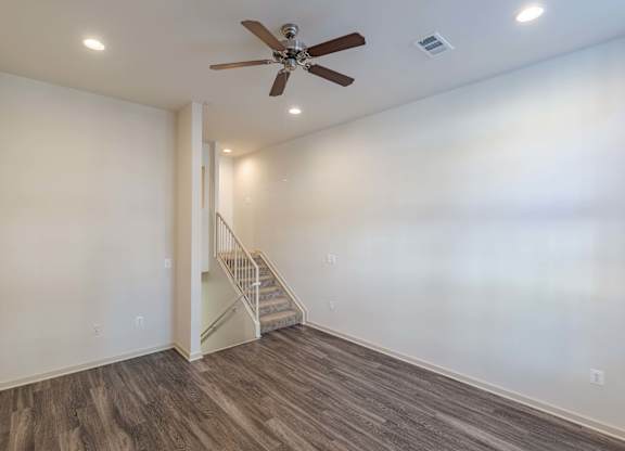 A room with a staircase and a ceiling fan at Garfield Park, Arlington, 22201