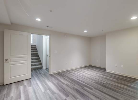 A room with a wooden floor and white walls at Garfield Park, Arlington, 22201