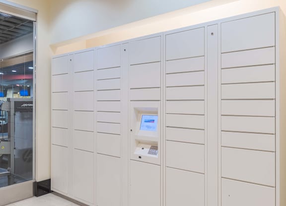 A row of white lockers with a keypad on the right side at Garfield Park, Arlington, 22201