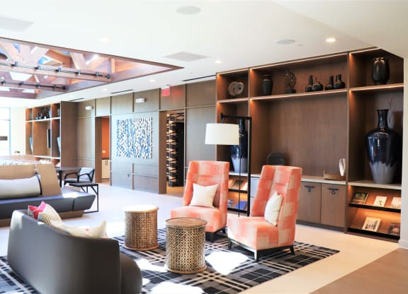 a living room filled with furniture and a large window at Vyne One Loudoun, Ashburn, Virginia