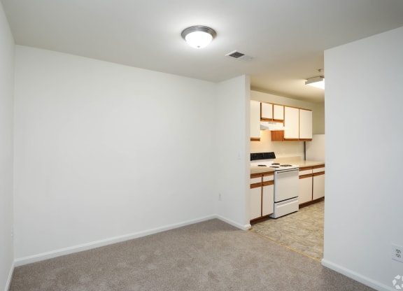 Living Room With Kitchen View at The Fields of Manassas, Manassas
