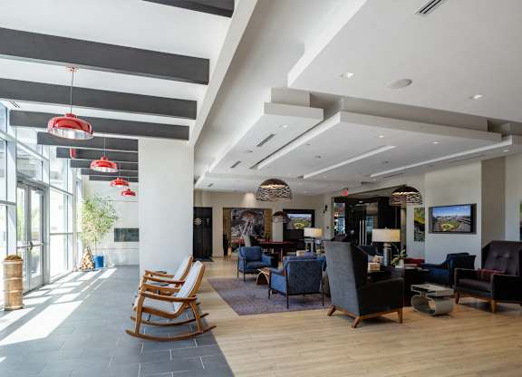 A spacious waiting area with wooden floors and multiple seating options. at Dock 79, Washington, DC 20003 