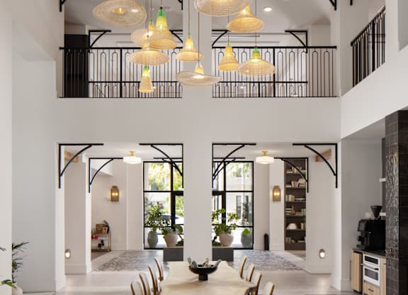 A modern dining room with a checkered floor and a long wooden table.