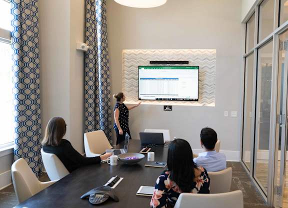 A Woman is Giving a Presentation at The Aster Cary, Cary