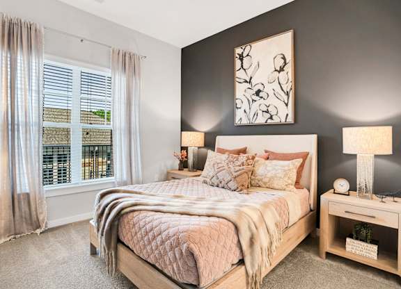 A Bedroom With a Window and Curtains at The Aster Cary, Cary, 27519