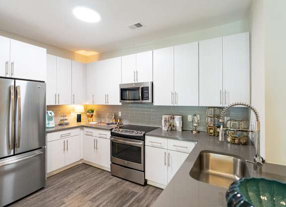 A Kitchen With White Cabinets at The Aster Cary, North Carolina, 27519