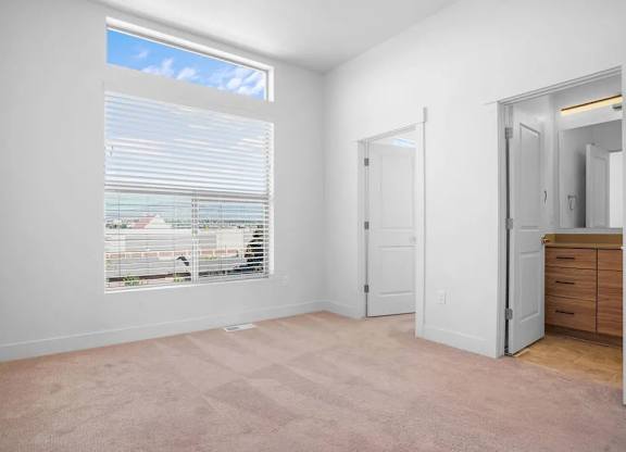 Room with carpeted floor at Vaseo Townhomes, Lehi, 84043