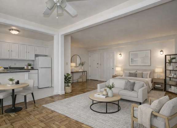 Open concept studio with living and dining area at Tivoli Gardens Apartments