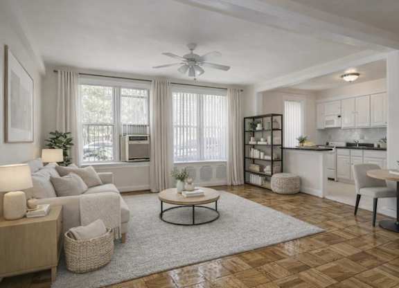 Open concept living area with modern kitchen at Tivoli Gardens Apartments, 20010