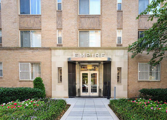 The front of a building with the word "Empire" written on it.