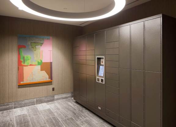 Package locker system with digital interface at 1305 Dock Apartments, Baltimore