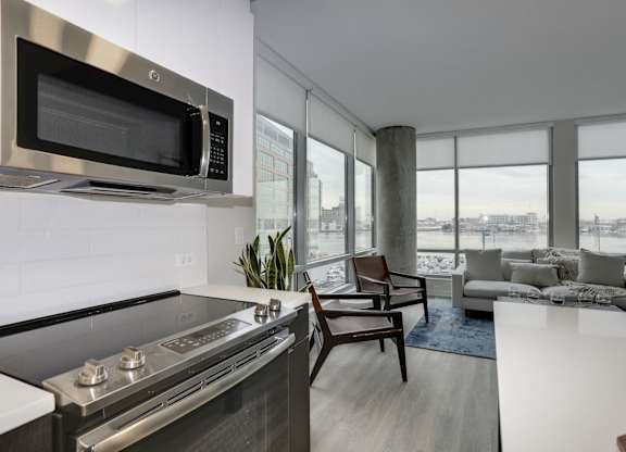 Modern apartment interior with city views at 1405 Point Apartments, Baltimore, MD