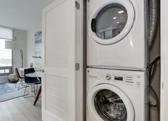 In unit washer and dryer laundry closet at 1405 Point Apartments, Baltimore, MD 21231