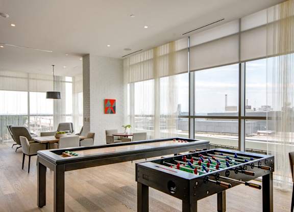 Recreation room with pool table and foosball at 1405 Point Apartments, Maryland