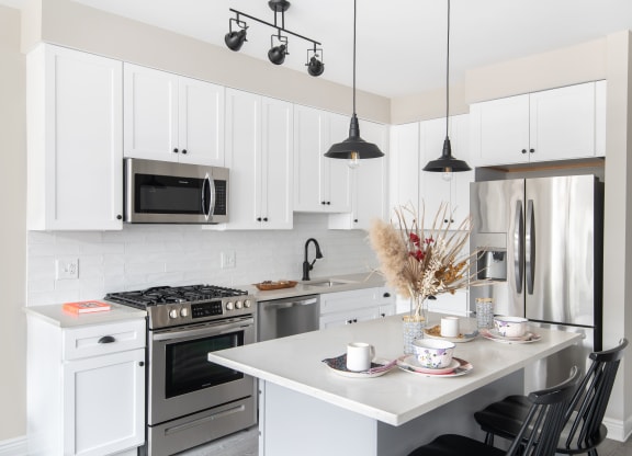 Gourmet Kitchen With Island at Park Kennedy, Washington, Washington