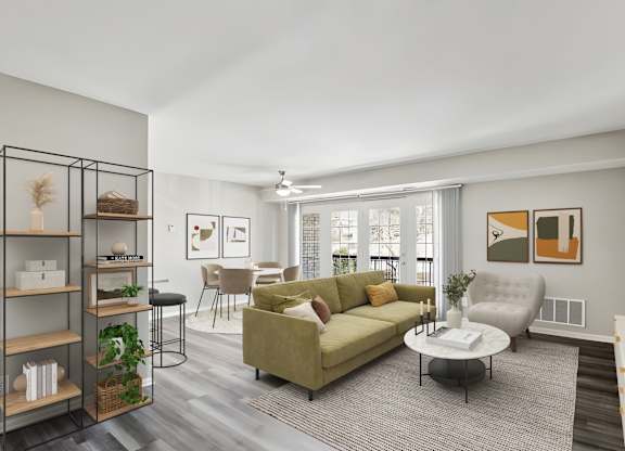 A living room with a green couch and a coffee table.