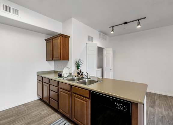 A kitchen with a wooden counter and a black oven.at Florentine Villas, Utah, 84047
