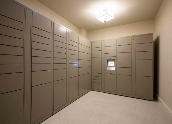 a row of lockers in a room with a light on at Woodmore Grand, Bowie