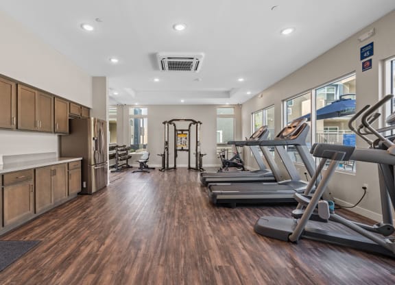 the gym at the enclave at woodbridge apartments in sugar land, tx at Loma Villas Apartments, San Bernardino