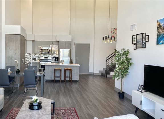 Living Room With Kitchen View at The Mansfield at Miracle Mile, Los Angeles, CA, 90036
