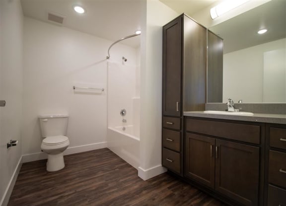 a bathroom at locale dallas victory park at Loma Villas Apartments, California