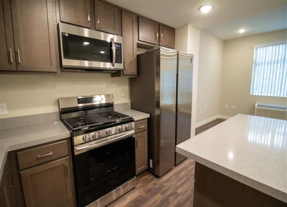 Fully Equipped Island Kitchen at Loma Villas Apartments, California, 92408