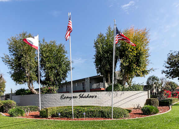 building with the name at Canyon Shadows Apartments, Riverside California 