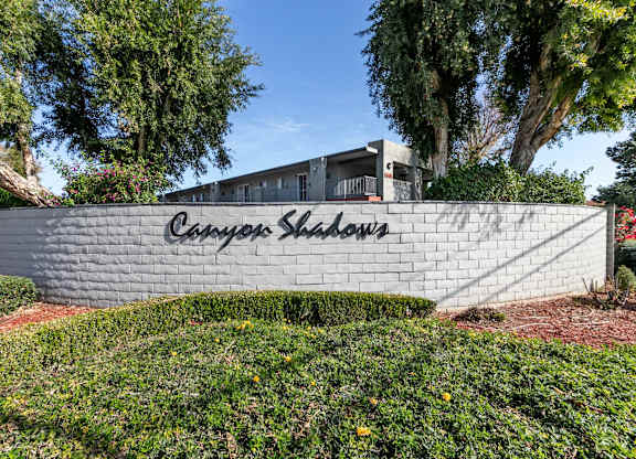 A wall with the words at Canyon Shadows Apartments, Riverside  
