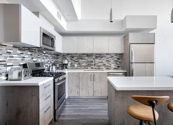 Model Kitchen with Island at The Mansfield at Miracle Mile, Los Angeles, CA