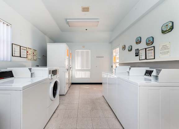 A laundry room with washers and dryers. at Whispering Fountains Diamond Bar, Diamond Bar California