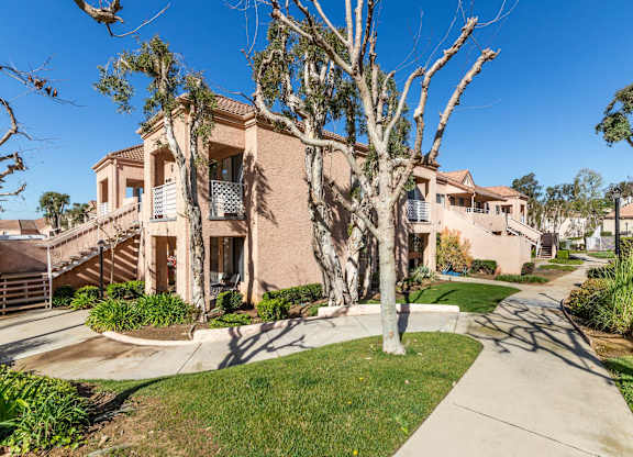 A house with a tree in front of it. at Whispering Fountains Diamond Bar, California, 91765