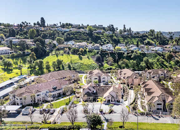 A residential area with houses and greenery. at Whispering Fountains Diamond Bar, California