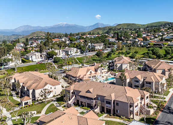 A bird's eye view of a residential area with houses and a road. at Whispering Fountains Diamond Bar, Diamond Bar