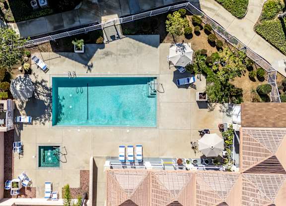 An aerial view of a house with a pool and a hot tub. at Whispering Fountains Diamond Bar, Diamond Bar, 91765