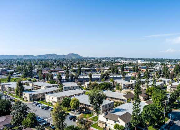 View of a residential area with houses and trees at Whispering Fountains Riverside, Riverside, CA, California , 92503