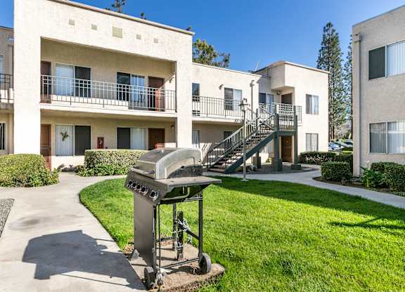 Courtyard With Bbq Area at Whispering Fountains Whittier, Whittier, CA, California