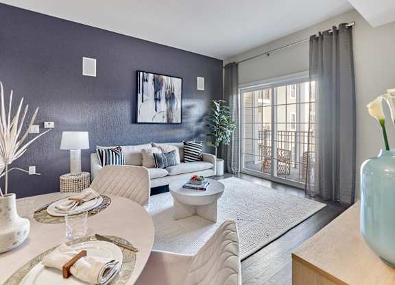 Spacious living room with large windows and private outdoor space at Vermella Lyndhurst apartments, Lyndhurst