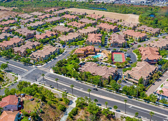A suburban neighborhood with houses and streets.