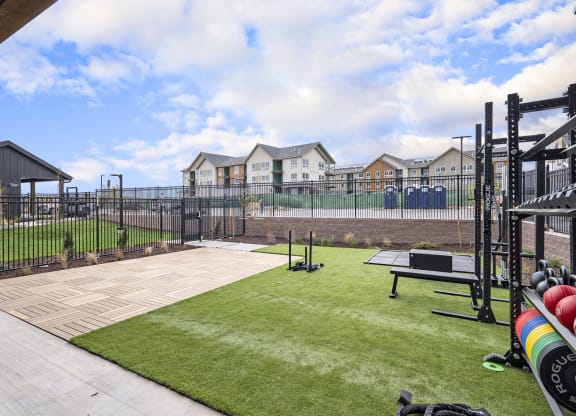 the clubhouse with a dog park and a ping pong table
