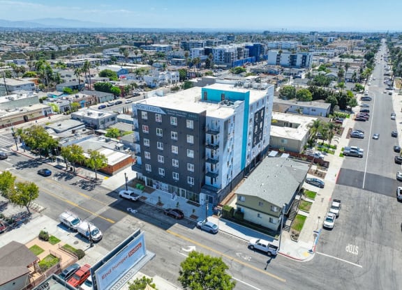 an aerial view of an apartment building in a city